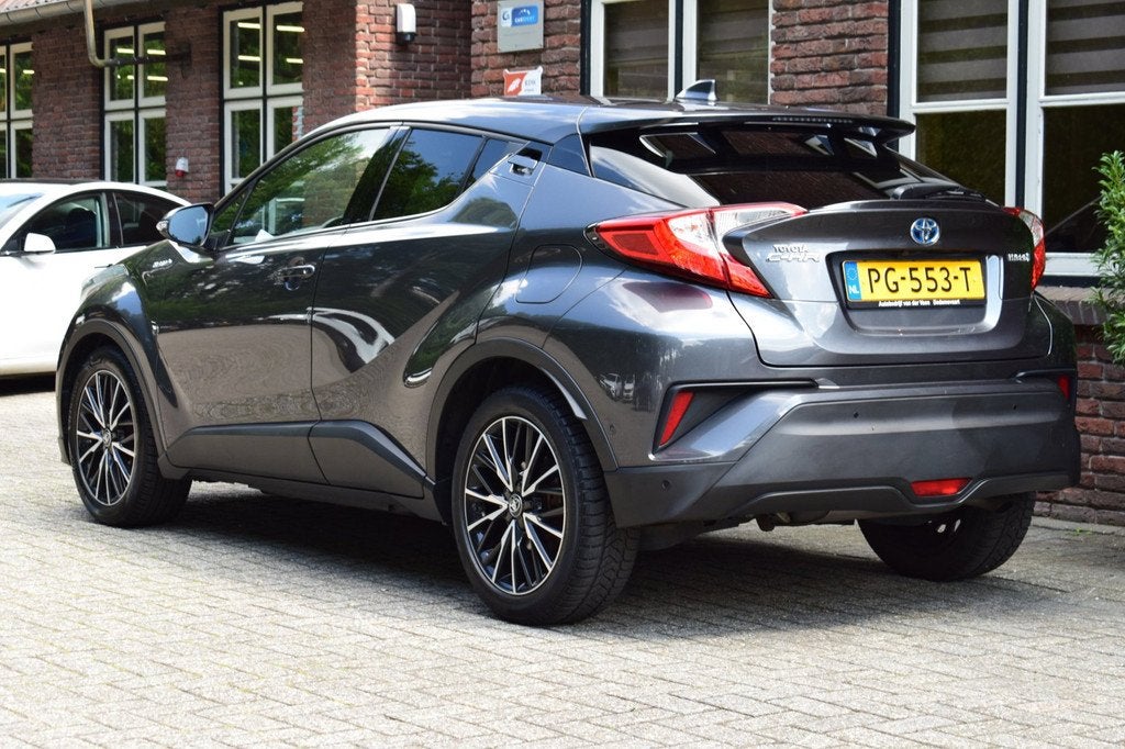 Toyota C-HR 1.8 Hybrid Executive Camera | Keyless | Stoelver, Auto's, Toyota, 4 cilinders, Met garantie (alle), Leder en Stof