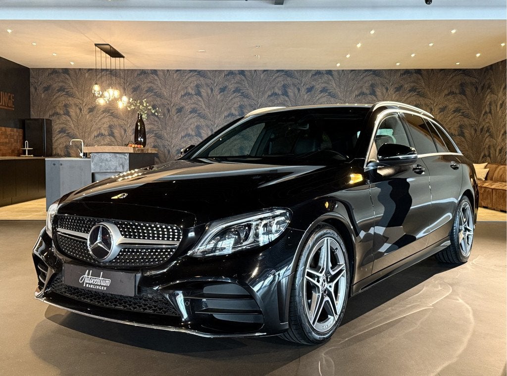 Mercedes-Benz C-Klasse Estate 200 AMG I Facelift I Virtual C, Auto's, Mercedes-Benz, 4 cilinders, 1465 kg, Zwart, Leder