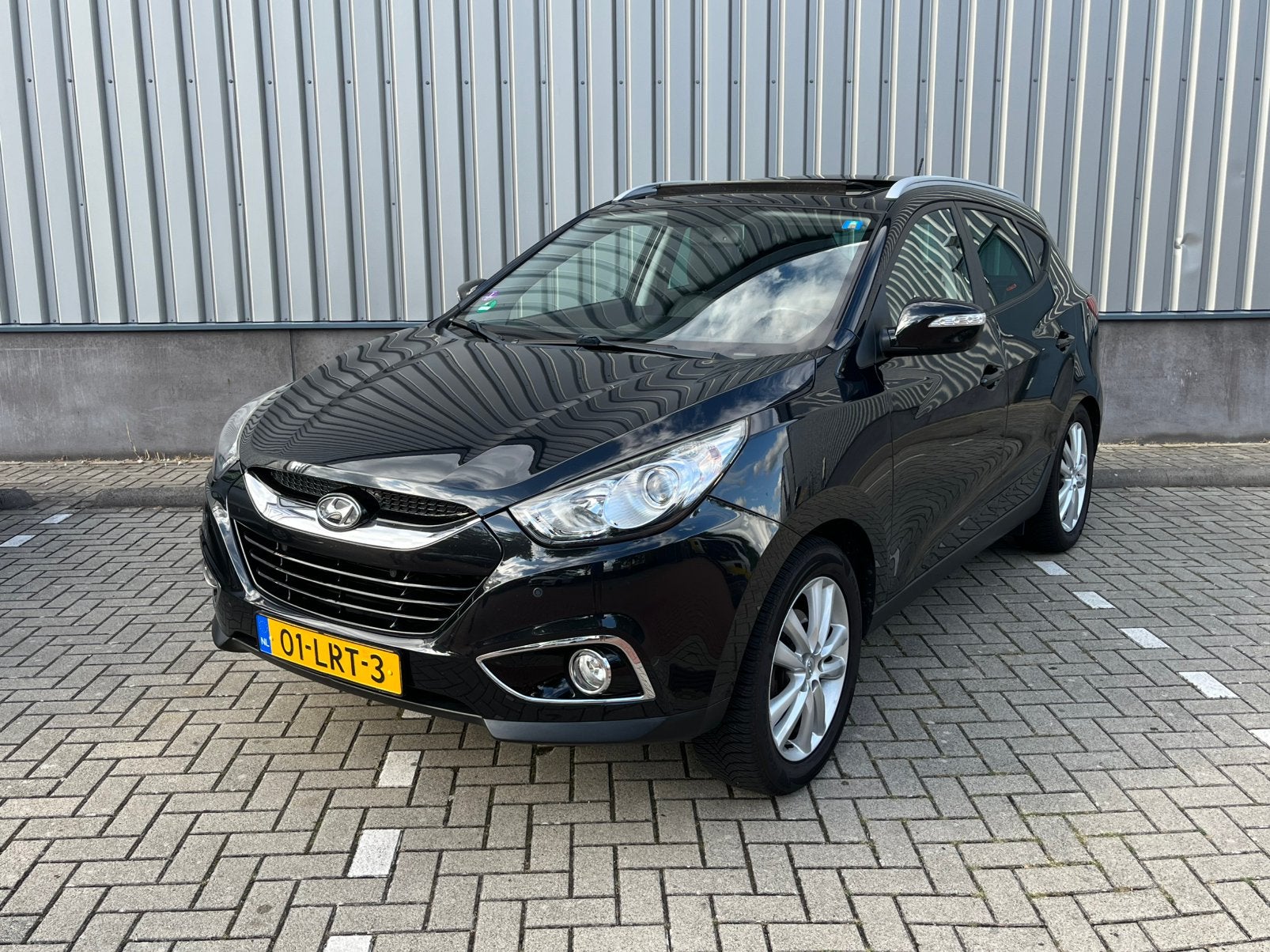 Hyundai iX35 i-Catcher 2.0 4WD Automaat (8mnd Garantie!), Auto's, Automaat, Lichtsensor, Zwart, 4 cilinders