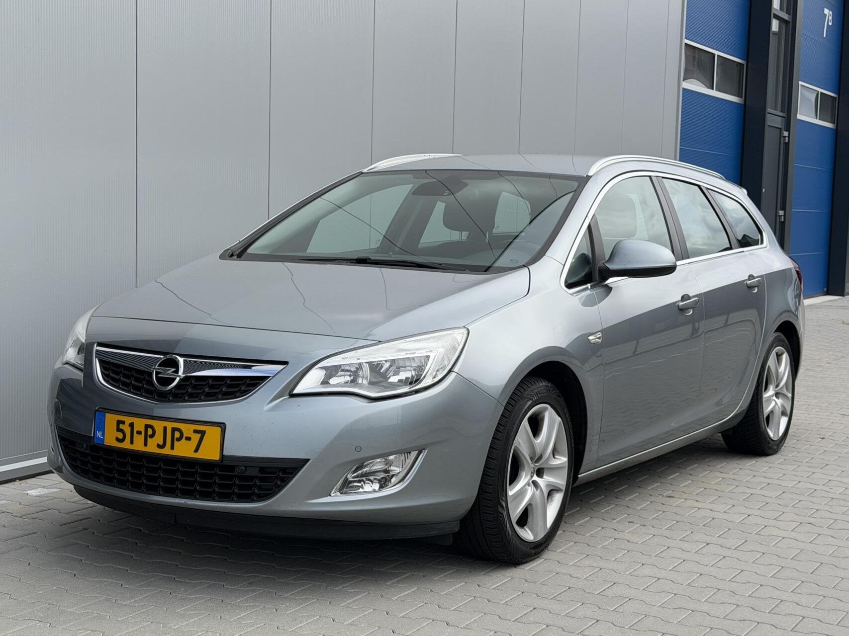 Opel Astra Sports Tourer 1.4 Turbo Sport, Voorwielaandrijving, Euro 5, Gebruikt, 4 cilinders