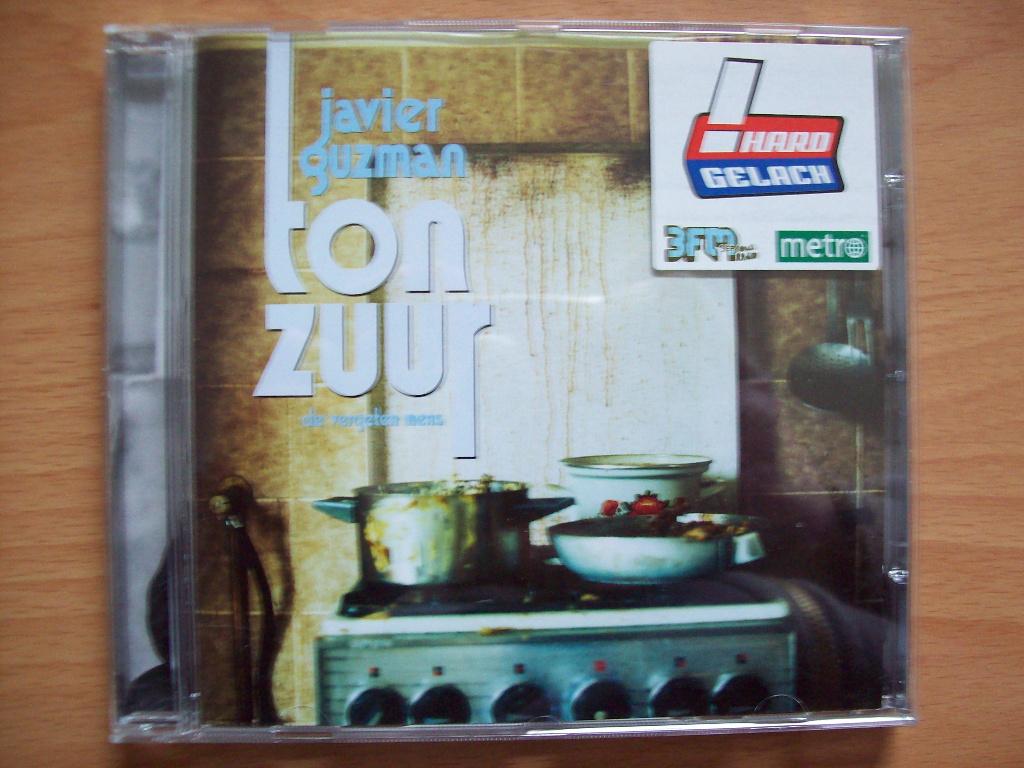 Javier Guzman - Ton Zuur: De Vergeten Mens (2006), Ophalen of Verzenden, Zo goed als nieuw