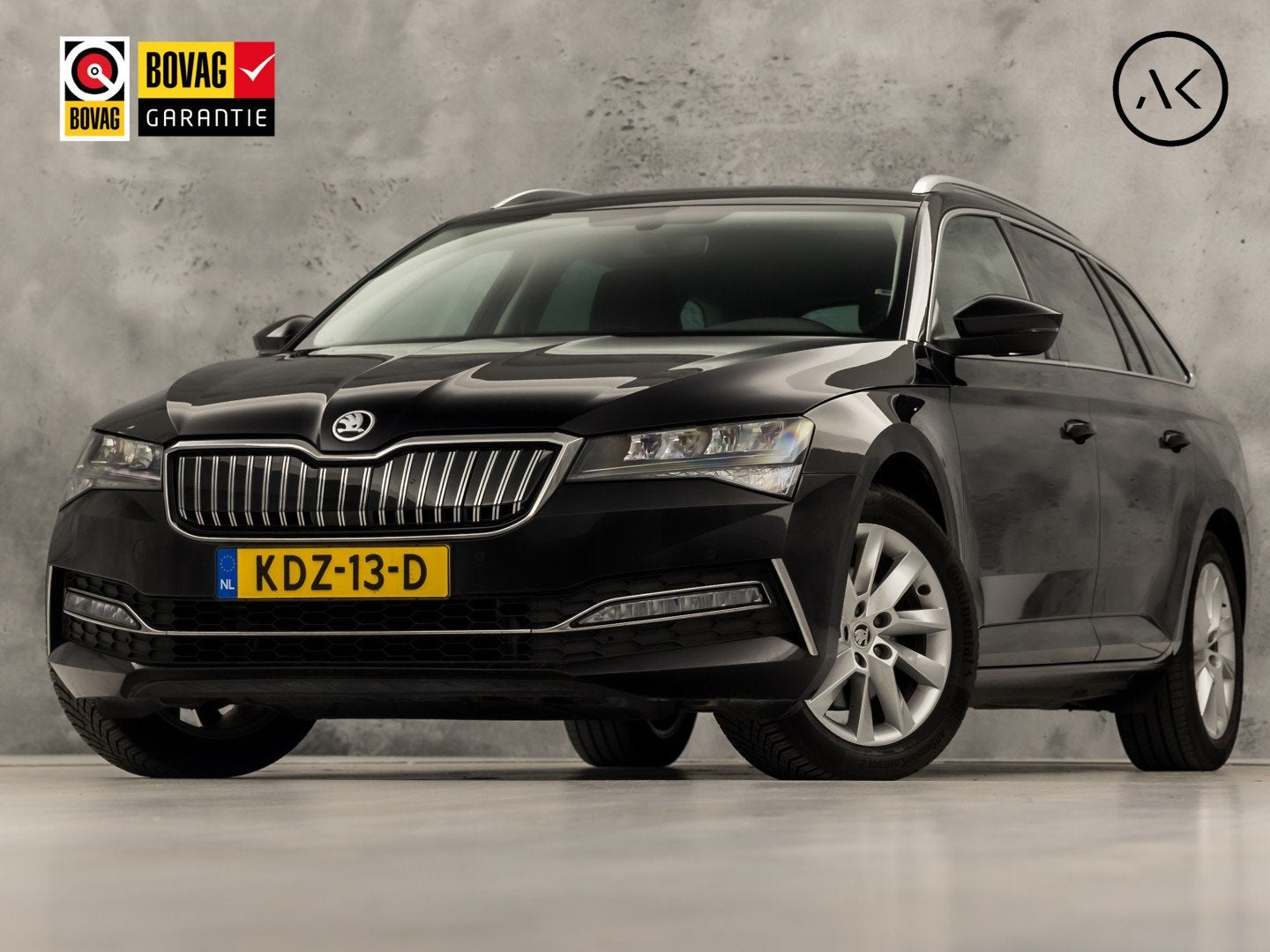 Skoda Superb Combi 1.4 TSI iV Business Sport 218Pk Automaat, Stof, Gebruikt, 4 cilinders, Zwart