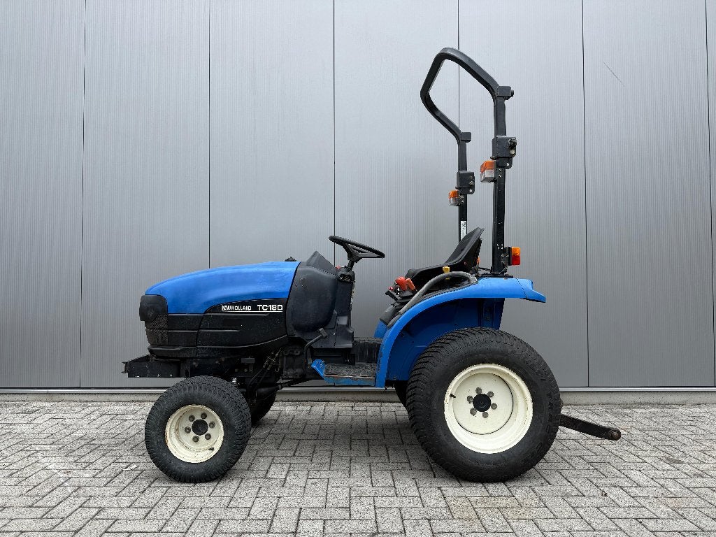New Holland TC18D - 20PK - 4WD - Kenteken - Gazonbanden, Ophalen, Gebruikt, Tot 2500, Tot 80 Pk