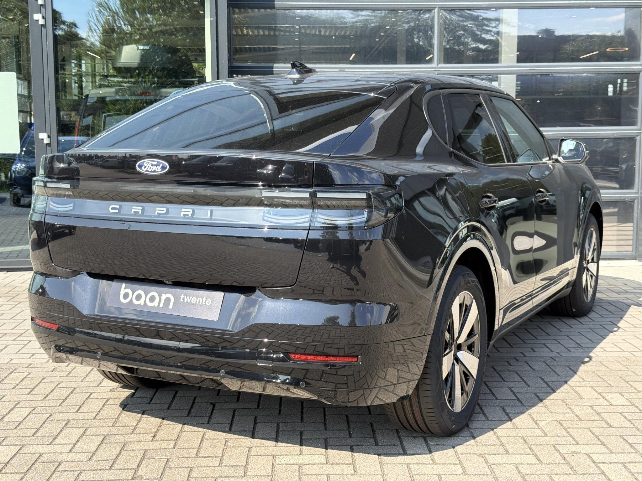 Ford Capri Select Extended Range RWD 79 kWh | Comfort Pack 1, Auto's, 12 maanden, Stof, Automatische klimaatregeling, Zwart