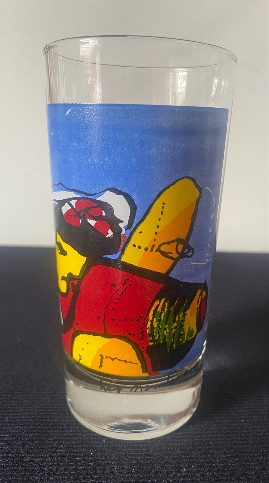Groot glas van Herman Brood met verzwaarde bodem. H.13,5 cm., Ophalen of Verzenden