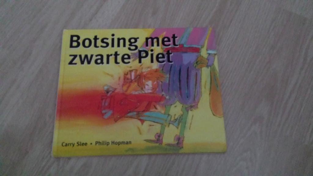 boek botsing met zwarte piet, Ophalen of Verzenden, Zo goed als nieuw