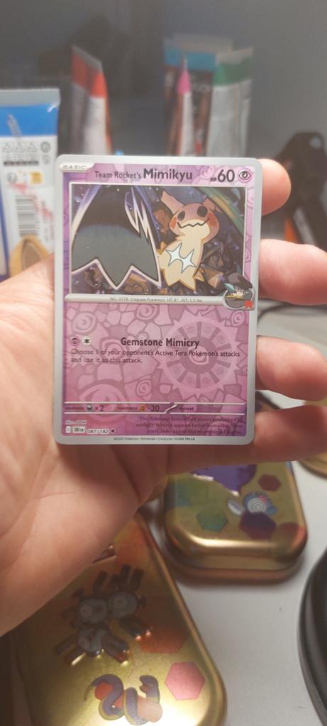 Team Rocket's Mimikyu Pokémon kaart, Ophalen of Verzenden, Zo goed als nieuw, Losse kaart
