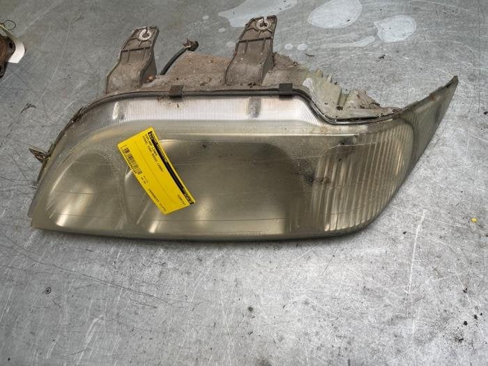 Koplamp links van een Ssang Yong Musso, Gebruikt, -, -, Ophalen of Verzenden