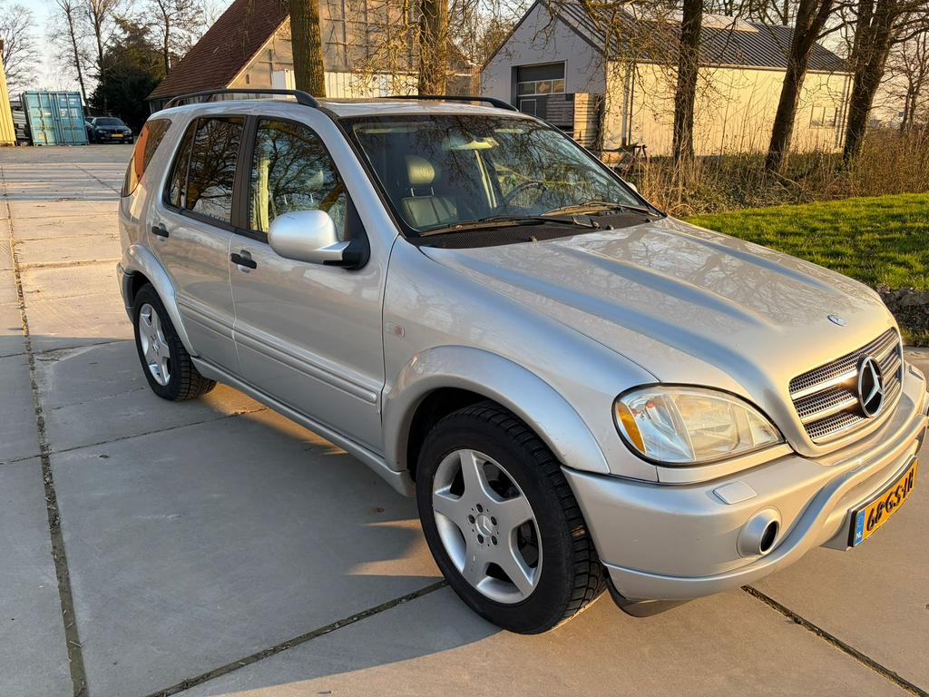 Mercedes-Benz ML 55 AMG LPG G3 Youngtimer V8 347PK 4x4 Bose, Auto's, Automaat, 2095 kg, 8 cilinders, 347 pk