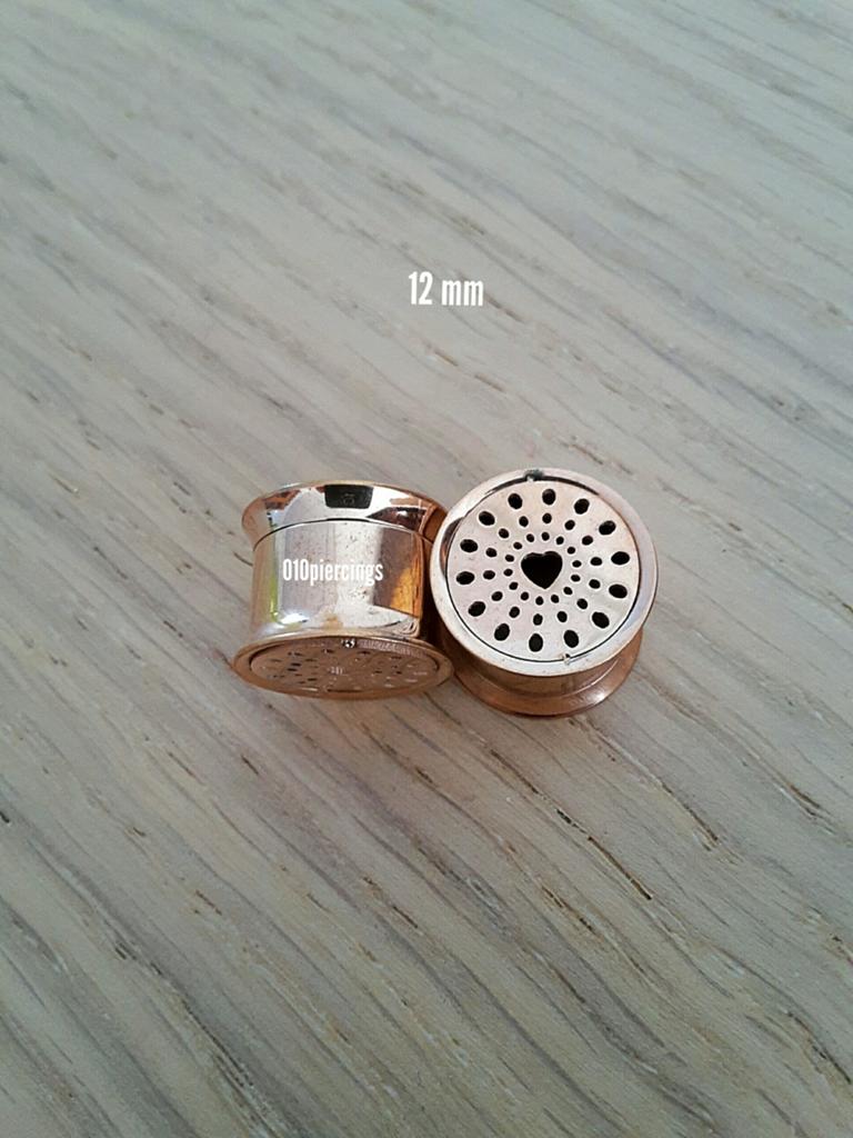 Nieuwe pluggen, tunnels. Staal. Rosé goud. Hartje. 12 mm., Ophalen of Verzenden, Zo goed als nieuw, Staal, Oor- of Traguspiercing