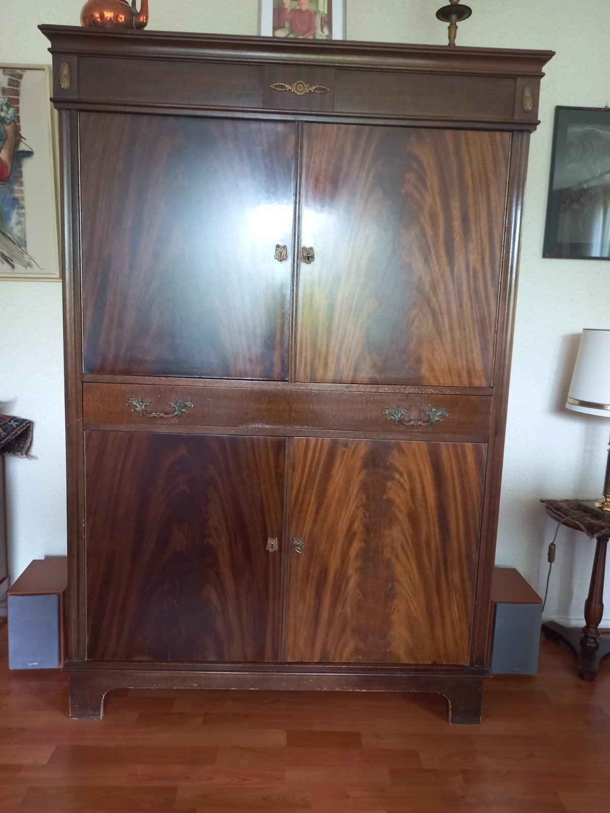 Klassieke mahoniehouten kast, Ophalen