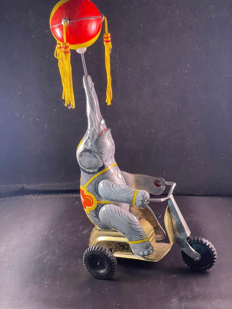 Vintage blikken olifant op scooter / blikken speelgoed, Ophalen of Verzenden