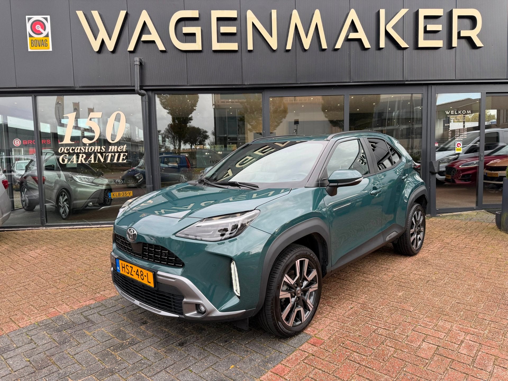Toyota Yaris Cross 1.5 Hybrid 130 Executive AUT|NAV|DealerOH, Auto's, 1195 kg, Gebruikt, Leder en Stof, Bedrijf