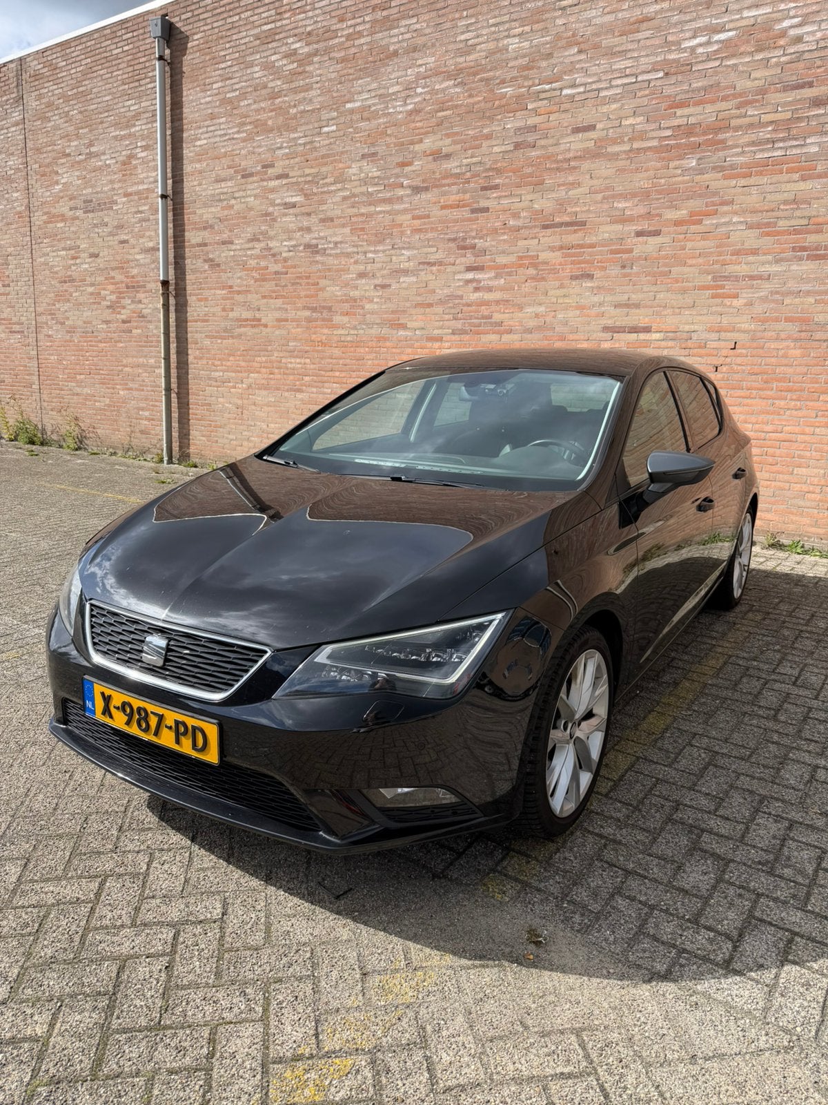 Seat Leon 1.2 TSI 110PK Dsg-7 2016 Zwart, Auto's, 1141 kg, 4 cilinders, Leon, Verwarmde buitenspiegels