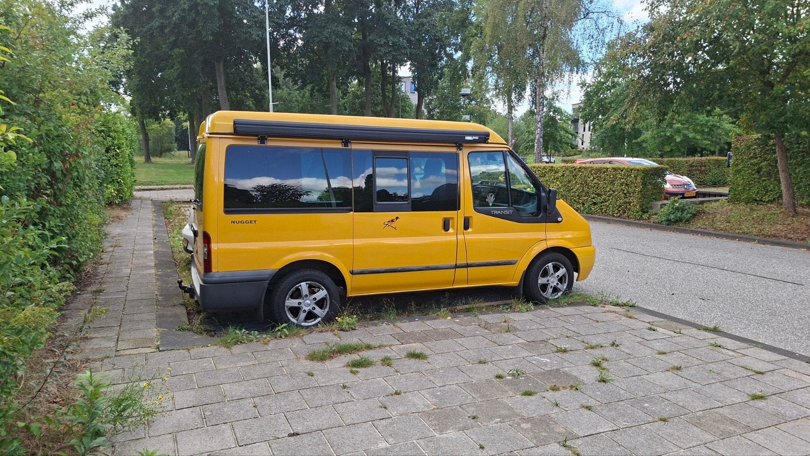Ford Transit 2.2 D 300S 103KW Kombi 2011 Geel, Auto's, Ford, Euro 5, Stof, 2000 kg, 2272 kg
