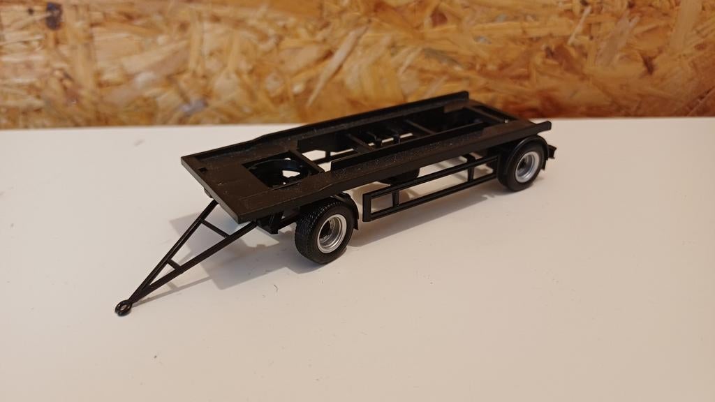 Herpa zwarte afrolcontainer aanhanger, Hobby en Vrije tijd, Modelauto's | 1:87, Ophalen of Verzenden, Nieuw, Bus of Vrachtwagen