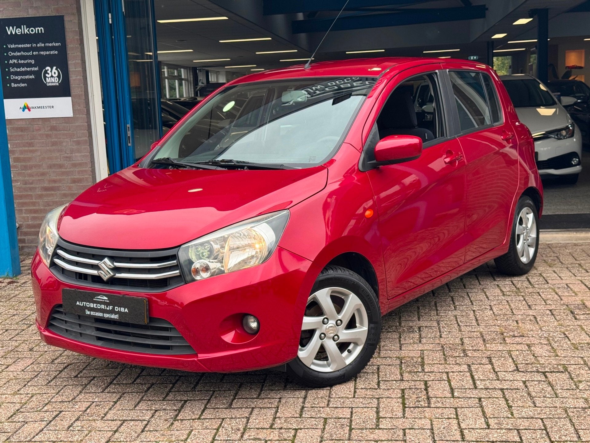 Suzuki Celerio 1.0 Exclusive 2016 Rood AIRCO APK NAP, Auto's, Dealer onderhouden, Gebruikt, 400 kg, 68 pk
