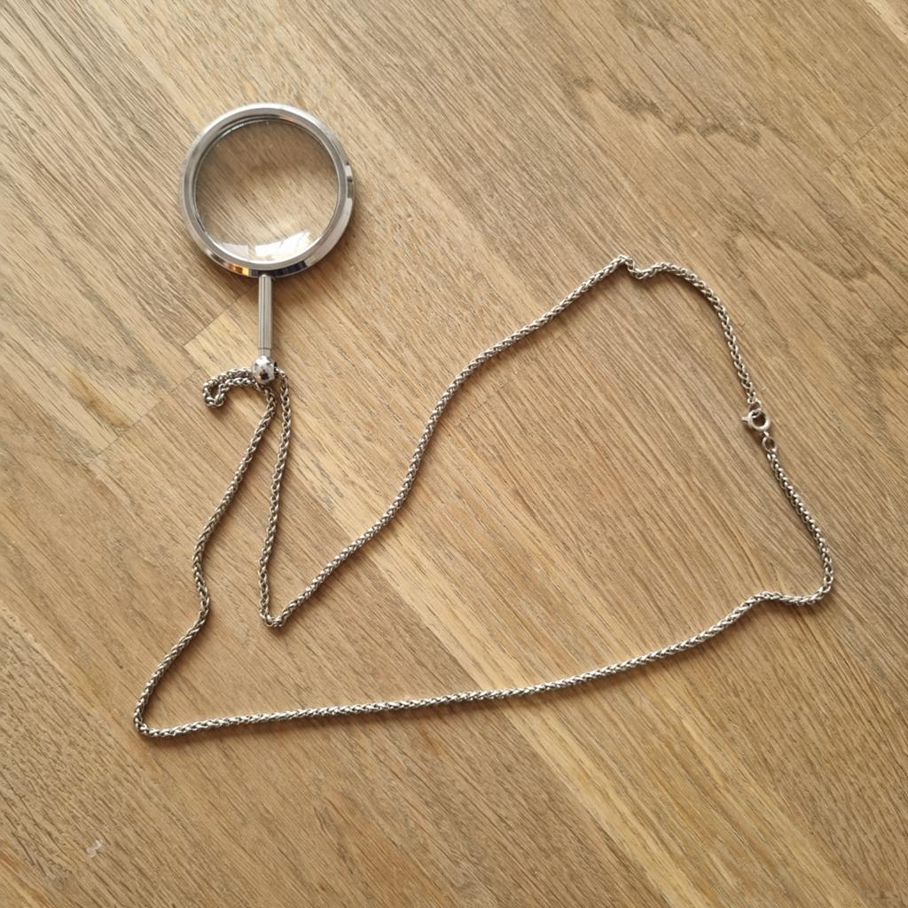 Zilverkleurige vergrootglas ketting met hanger, Ophalen of Verzenden, Zo goed als nieuw, Zilver, Overige materialen