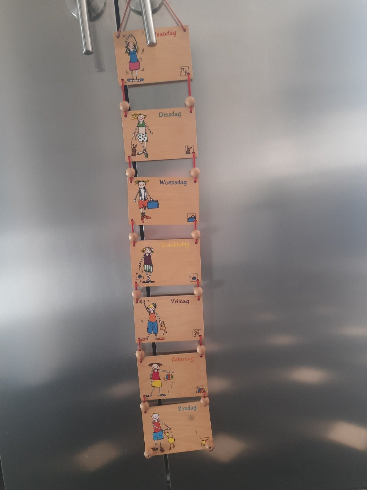 Houten dagen van de week kalender voor kinderen, Ophalen
