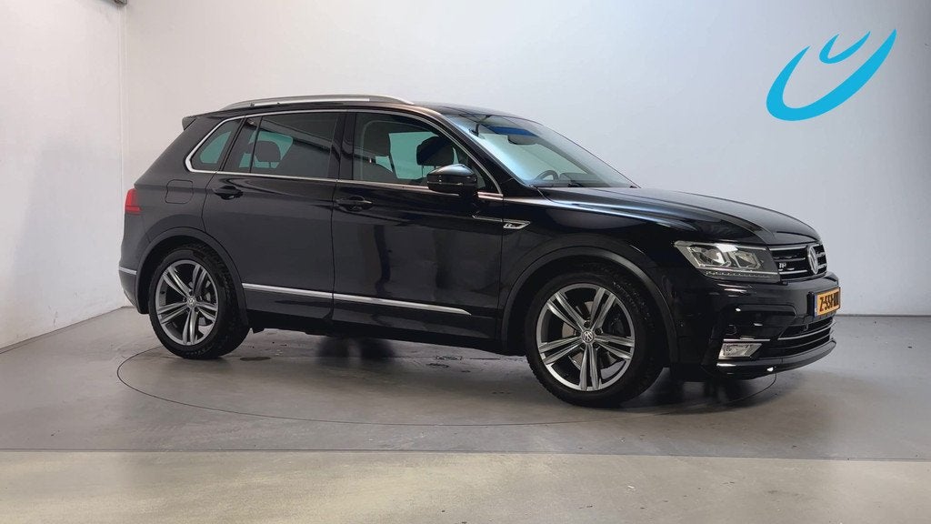 Volkswagen Tiguan 2.0 TSI 180pk 4Motion Highline Stoelverwar, Auto's, Automaat, Gebruikt, 4 cilinders, Alcantara