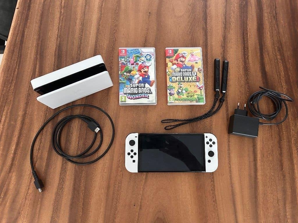 Nintendo Switch OLED met 2 games, Switch OLED, Met 2 controllers, Ophalen of Verzenden, Gebruikt