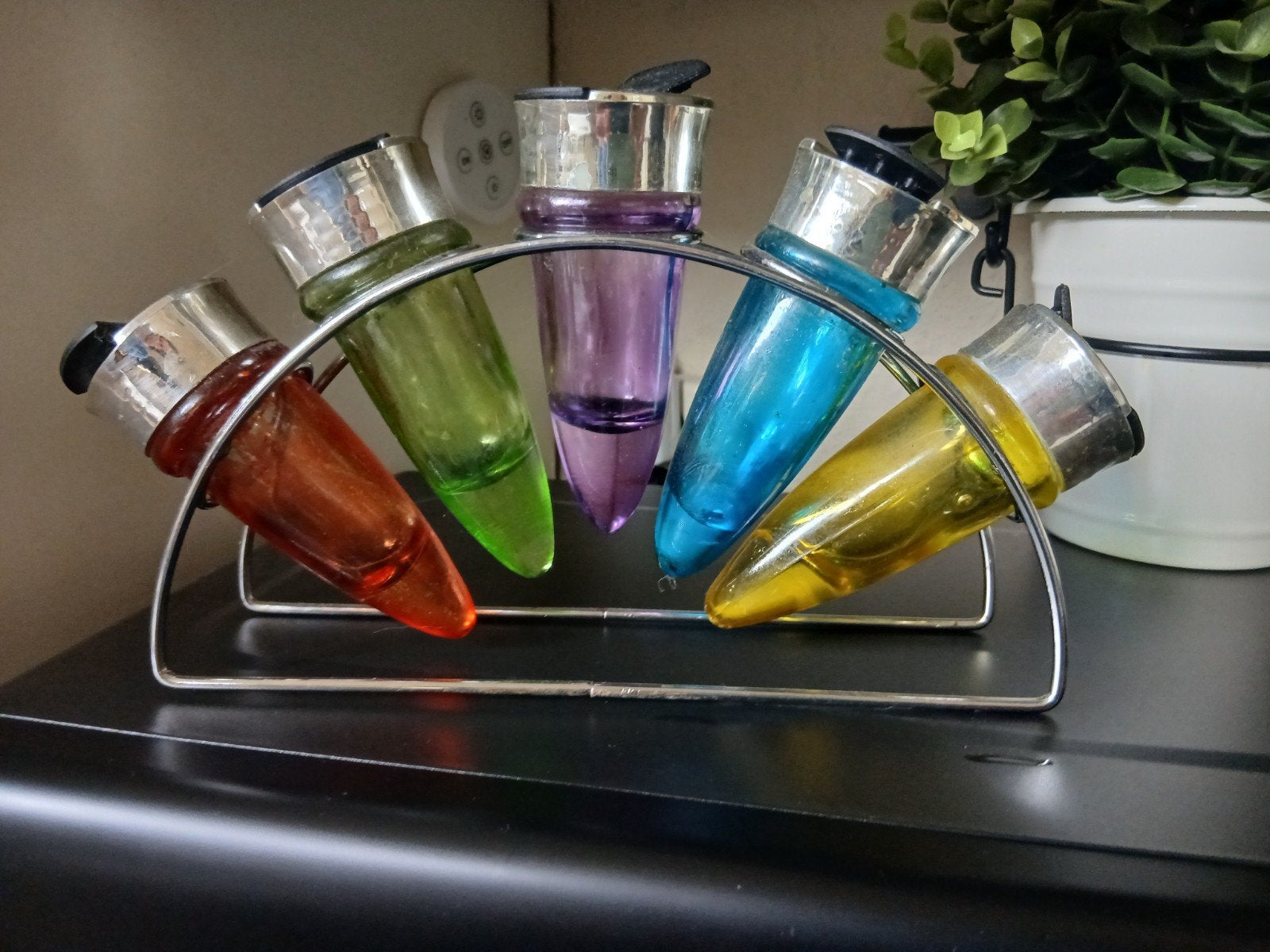 oude gekleurde kruidenpotjes, Ophalen