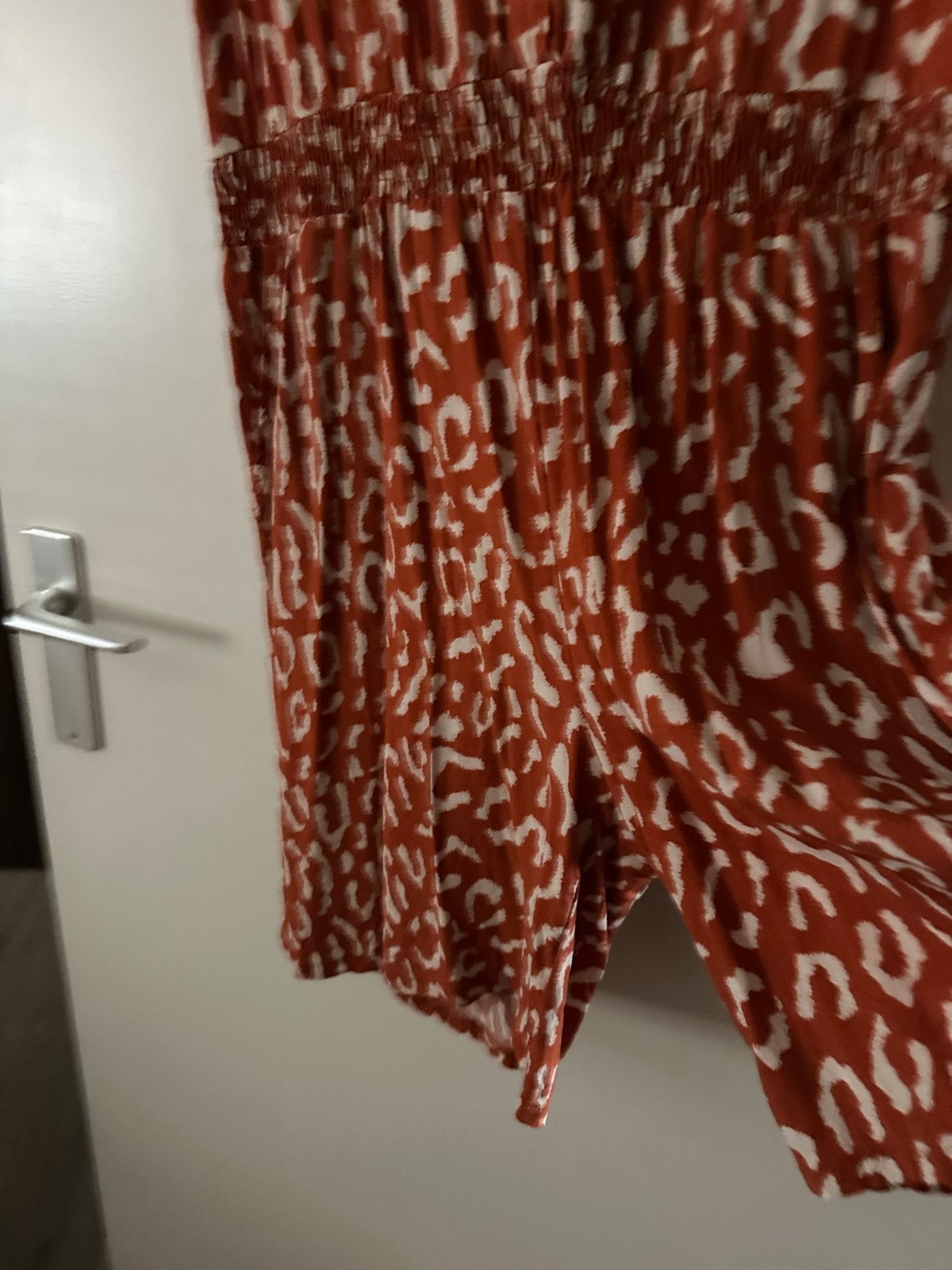 Leopardprint jumpsuit maat 42, Kleding | Dames, Jumpsuits, Verzenden, Zo goed als nieuw, Maat 42/44 (L), Oranje