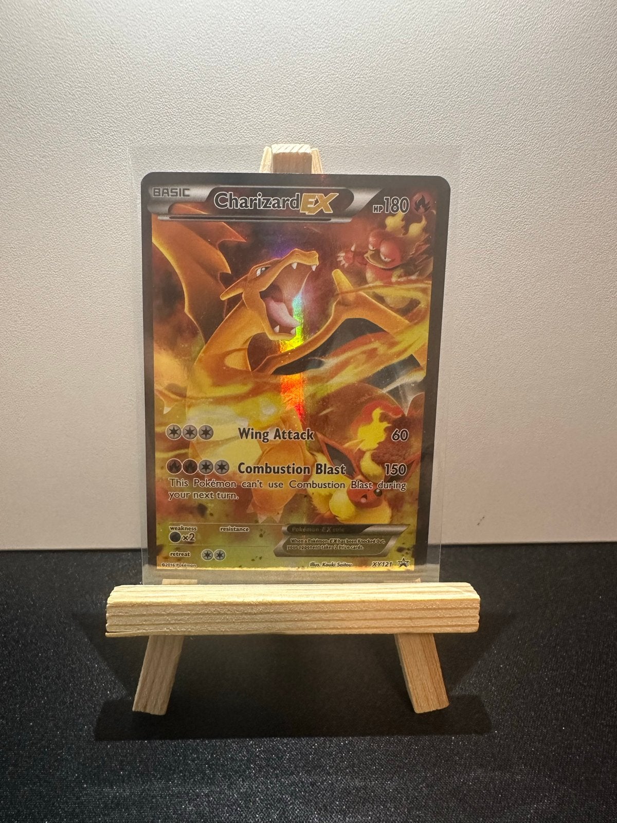 Charizard EX XY121, Ophalen of Verzenden, Zo goed als nieuw, Losse kaart, Foil