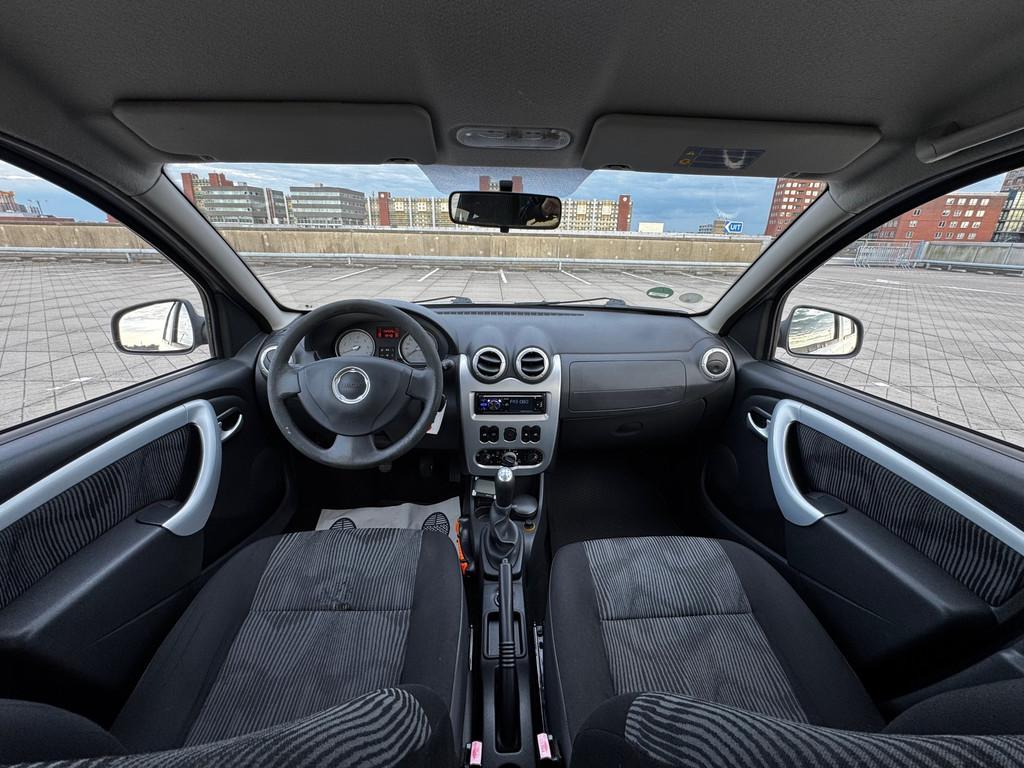 Dacia Sandero 1.2 Lauréate AIRCO 1STE EIGENAAR TREKHAAK NAP, Voorwielaandrijving, Stof, Gebruikt, Origineel Nederlands