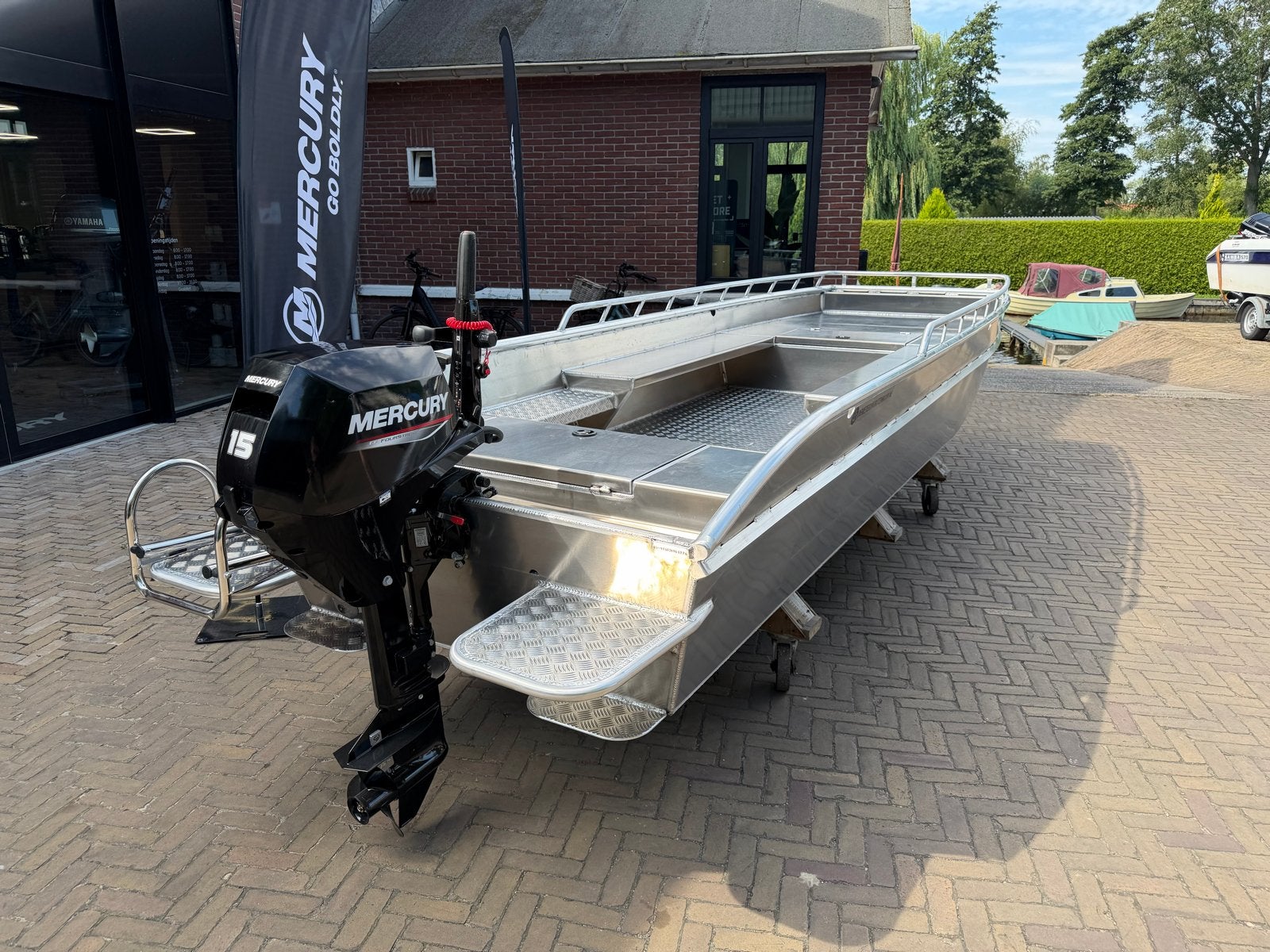 Nieuwe zelflozende Wetering aluminium platbodem met Mercury, Benzine, Overige merken, Buitenboordmotor, Aluminium