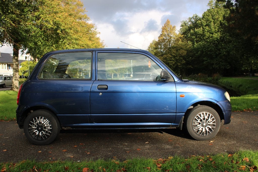 Daihatsu Cuore 1.0 AUTOMAAT 2002 Blauw, Auto's, 600 kg, Cuore, Origineel Nederlands, Grijs