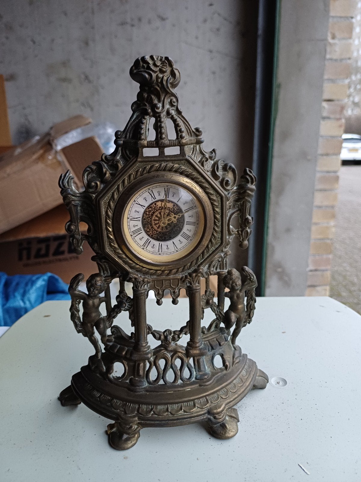 Antieke bronzen tafelklok met cherubijnen, Ophalen of Verzenden