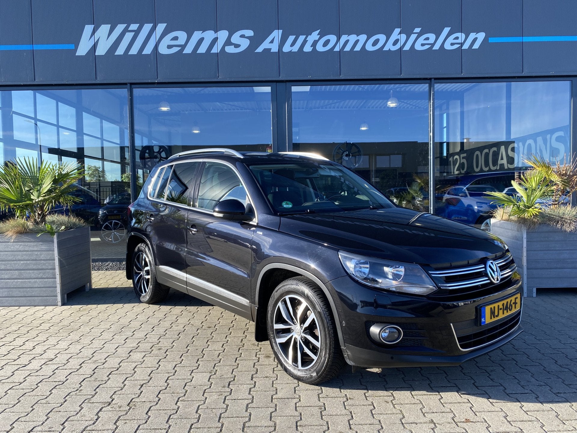 Volkswagen Tiguan 1.4 TSI Sport&Style Stoelverwarming, Trekh, Auto's, Voorwielaandrijving, Euro 5, Zwart, 4 cilinders