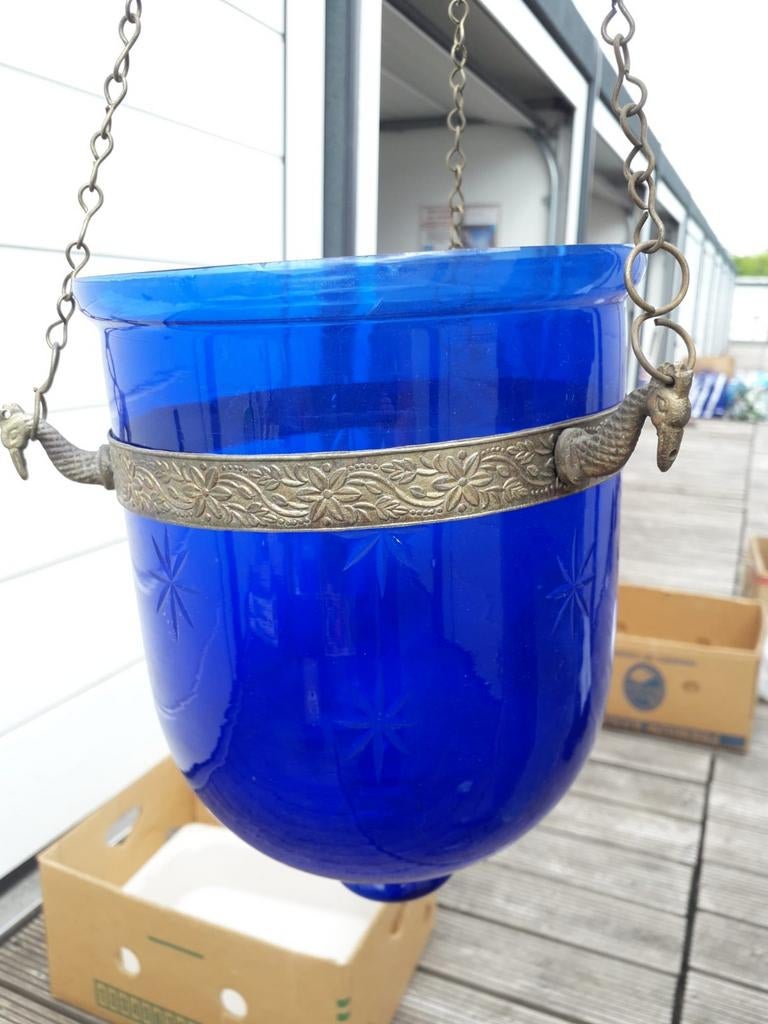 Blauwe lantaarn. Glas, Ophalen