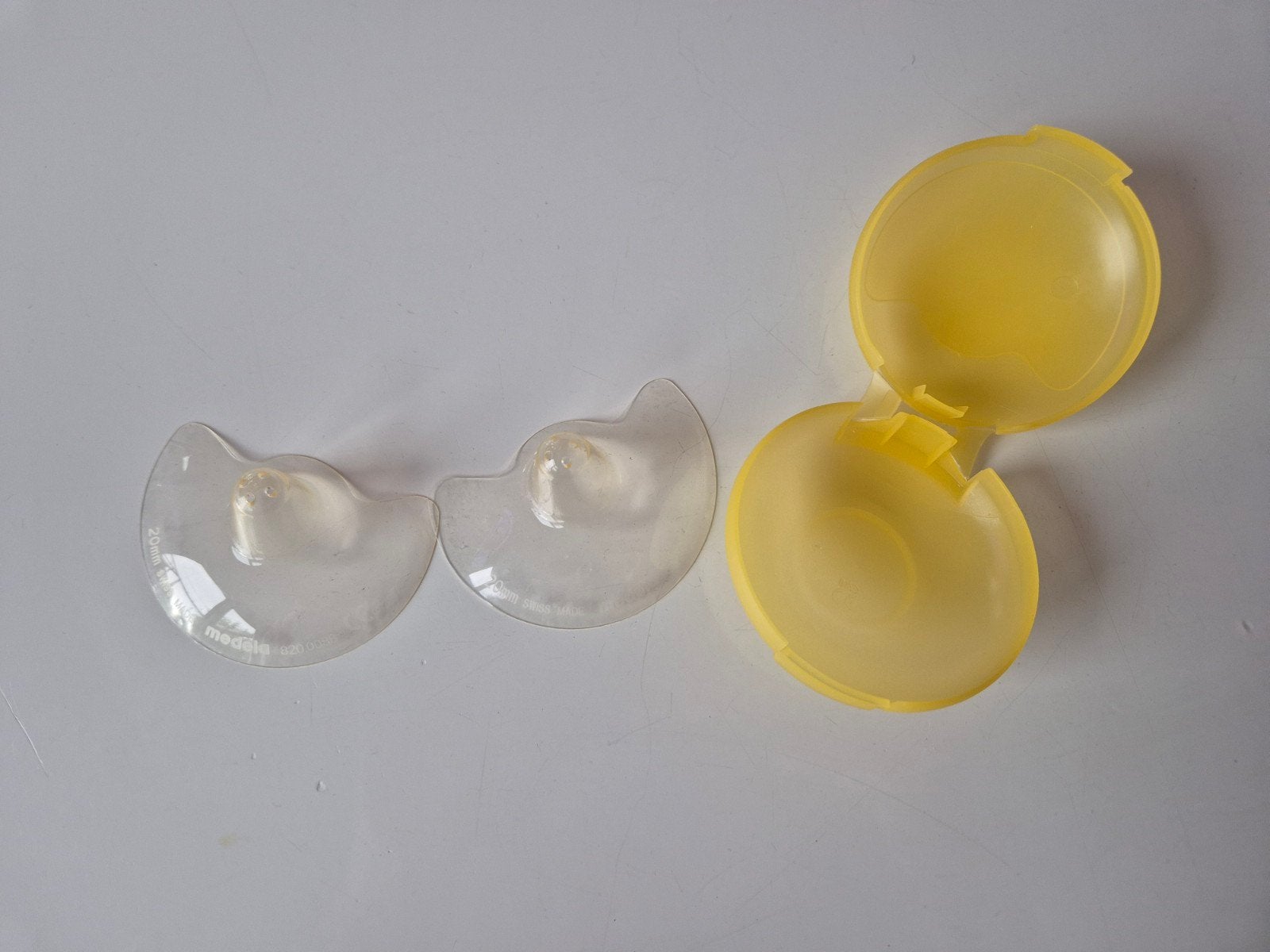 Medela Tepelhoedjes 20mm met opbergdoosje, Ophalen of Verzenden, Zo goed als nieuw