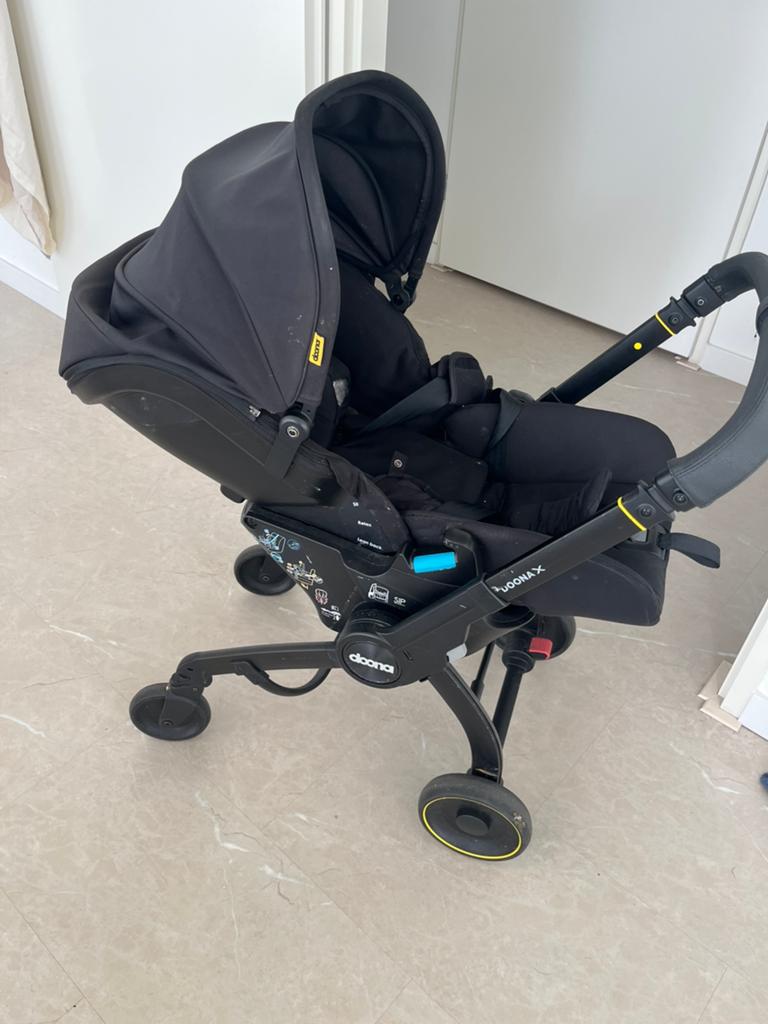 Doona X, Kinderen en Baby's, Buggy's, Ophalen of Verzenden, Zo goed als nieuw, Regenhoes
