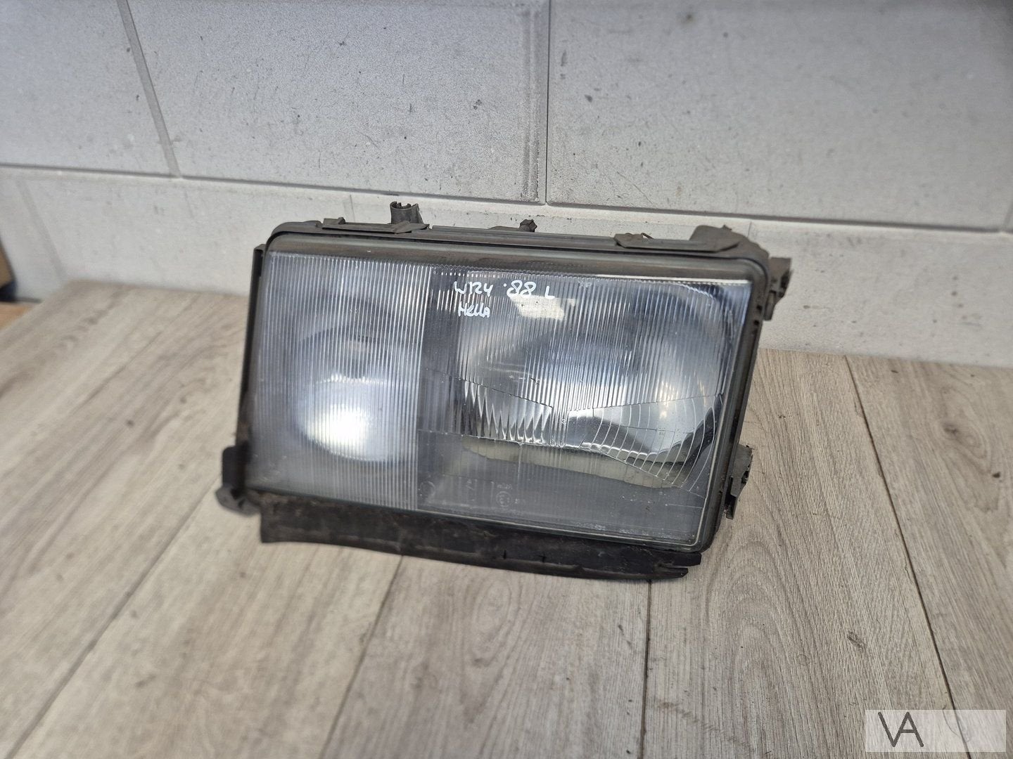 Koplamp links van Mercedes W124 E klasse 1985 - 1995 HELLA, Gebruikt, -, Ophalen of Verzenden, -