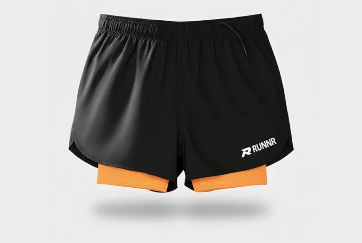 RUNNR 2-in-1 Hardloopshort zwart/oranje (NIEUW), Maat 52/54 (L), Zwart, Nieuw, Ophalen of Verzenden