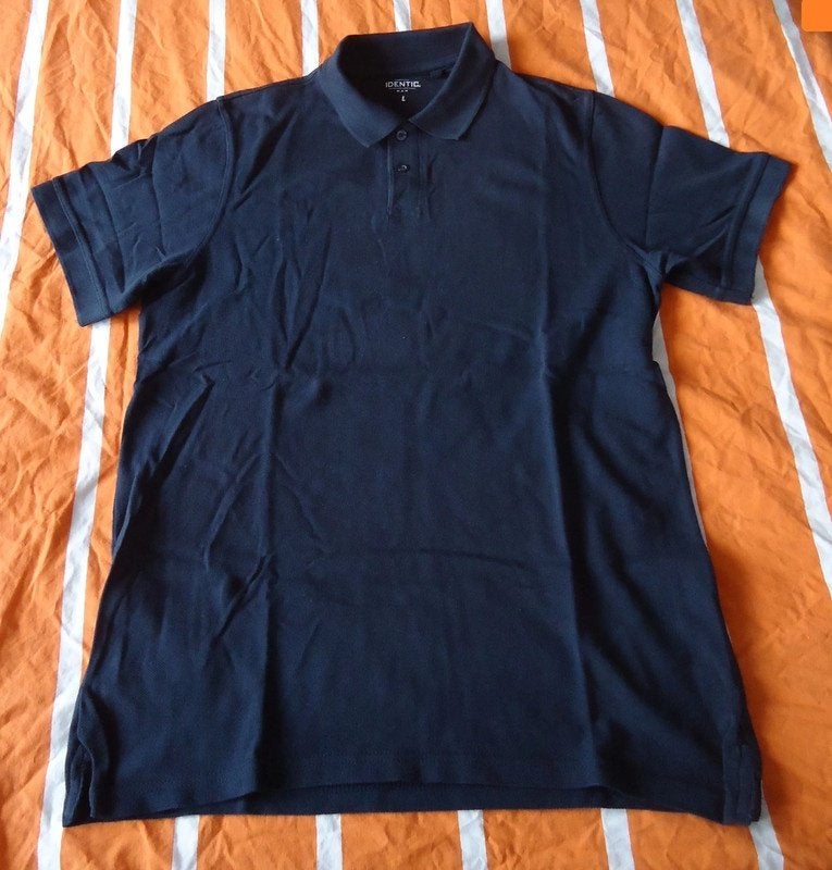 Te koop een nieuwe donkerblauwe polo van Identic (maat: L)., Maat 52/54 (L), Blauw, Nieuw, Ophalen of Verzenden