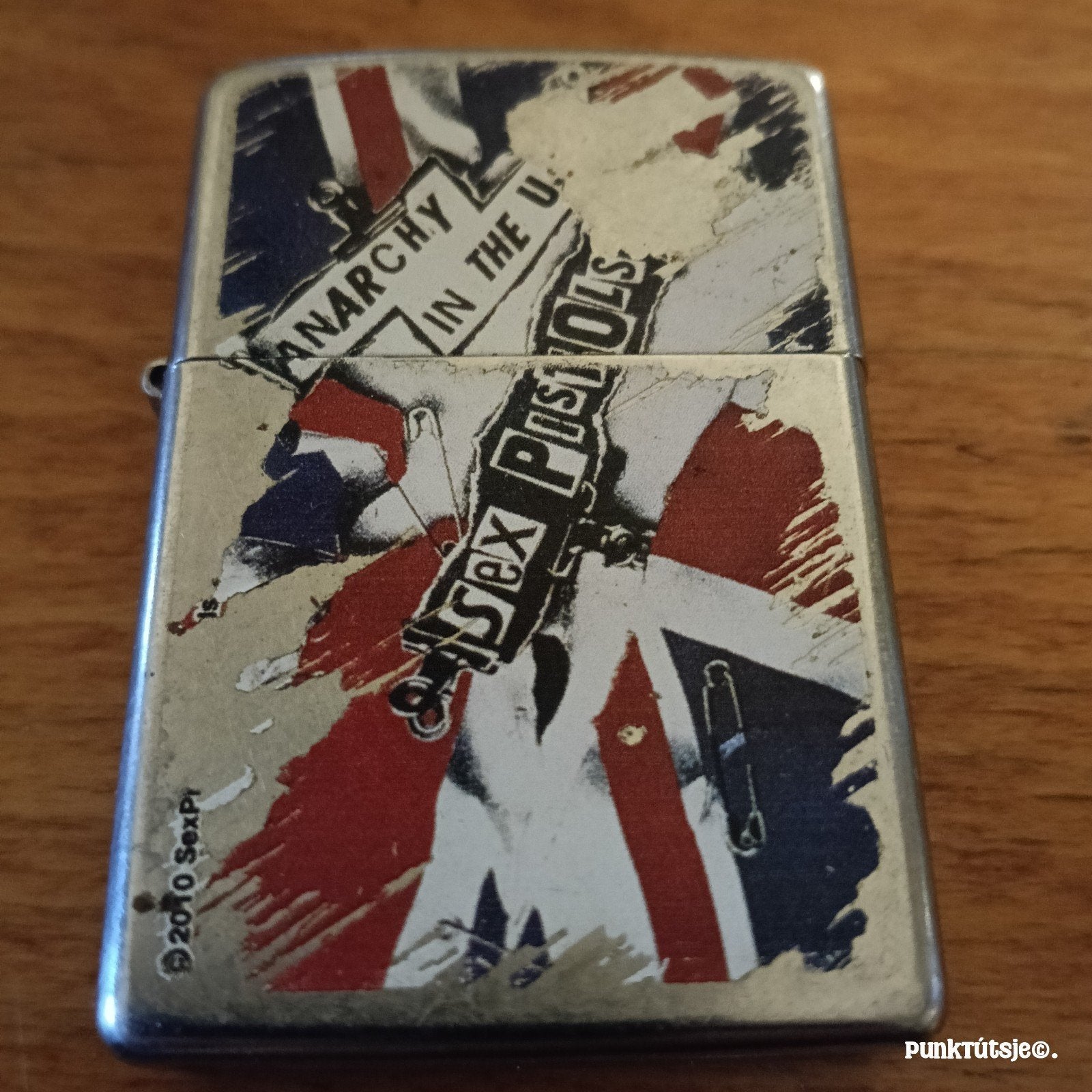 Sex Pistols Zippo - Limited Edition Collectors Item, Ophalen of Verzenden, Gebruikt, Aansteker
