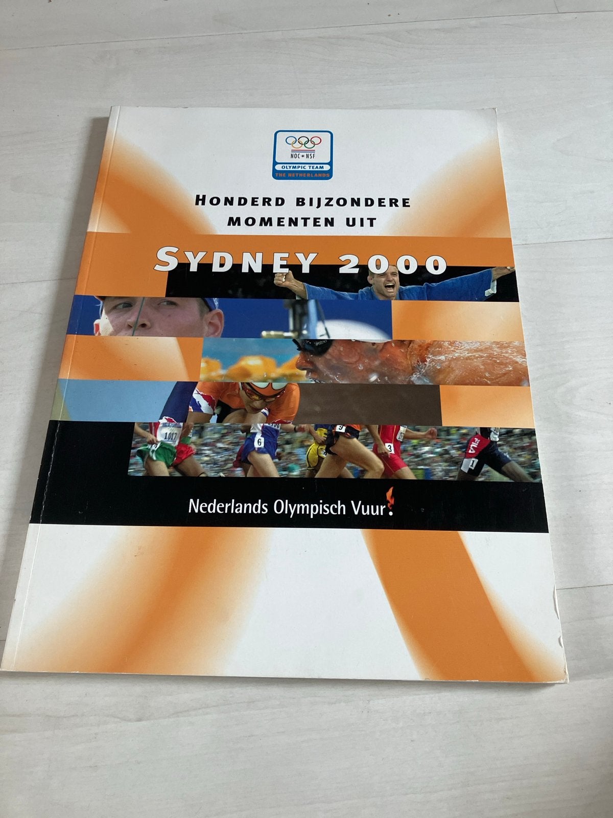 Honderd Bijzondere Momenten uit Sydney 2000, Ophalen of Verzenden, Gelezen, Overige sporten