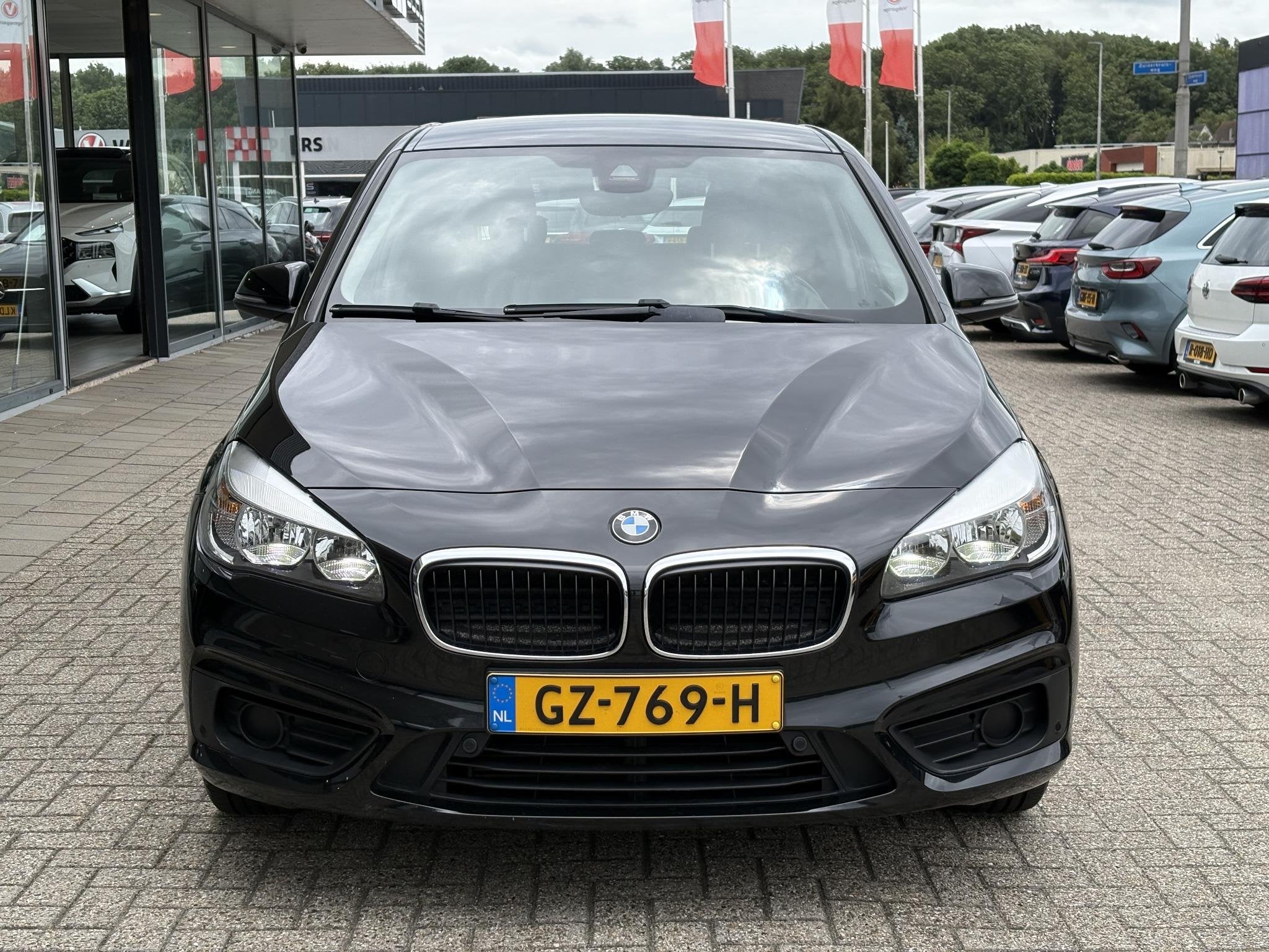 BMW 2-serie Active Tourer 218i Sport 136pk | Automaat | Park, Auto's, Gebruikt, Euro 6, LED verlichting, Zwart