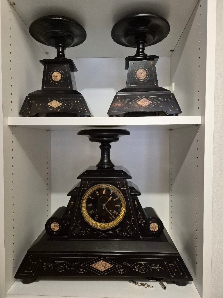 antieke klok met 2 siercoupes rond 1900, Ophalen