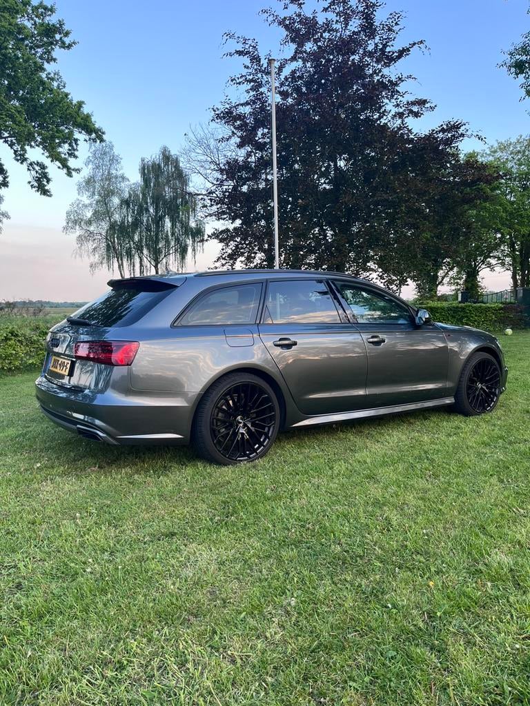 Audi A6 1.8 Tfsi Ultra 190pk S Tronic 2017 Grijs, Auto's, Stof, 1610 kg, Zwart, Stationwagon