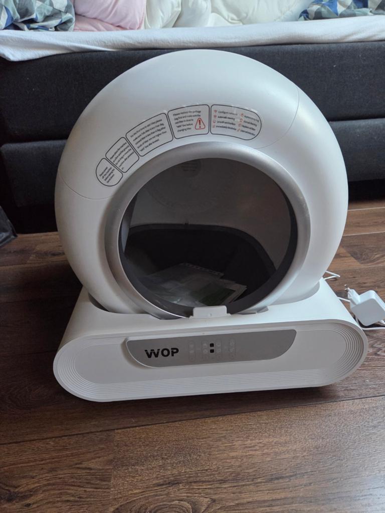 Wop zelf  reinigende kattenbak, Ophalen