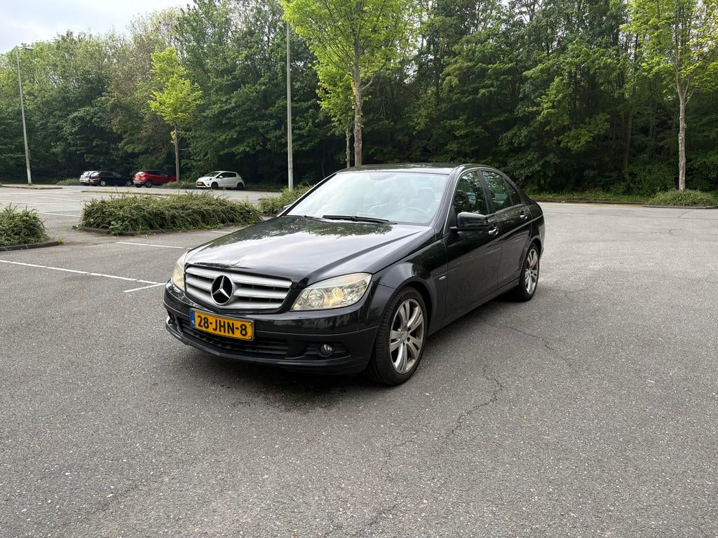 Mercedes-Benz C-Klasse 1.6 C180 Kompr. Sedan 2009 Zwart, Auto's, Zwart, Handgeschakeld, Particulier, Sedan