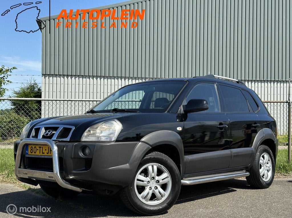 Hyundai Tucson 2.0i Style|Trekhaak|Leer|Clima|PDC|Cruise, Auto's, Hyundai, Gebruikt, 4 cilinders, Zwart, Handgeschakeld