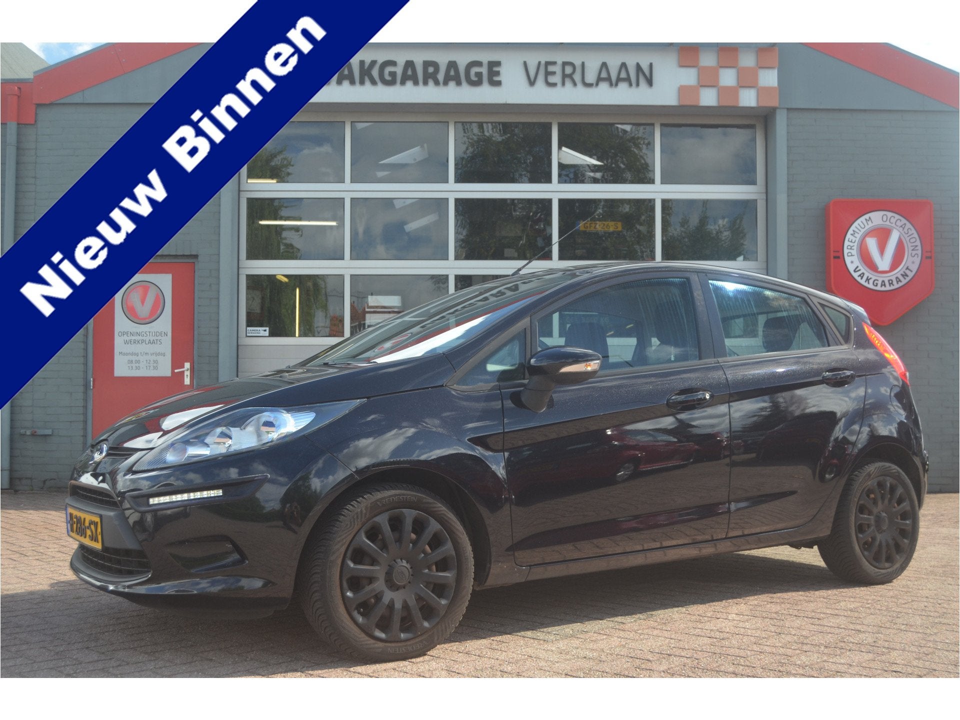 Ford Fiesta 1.25 luxe...12 mnd. gar.... (bj 2010), Voorwielaandrijving, 1242 cc, Zwart, Bedrijf