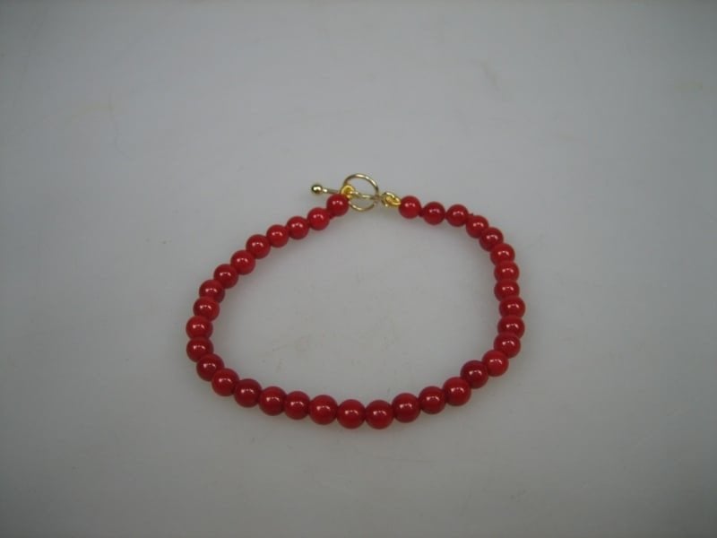 Antieke Bloedkoralen Baby Armbandje met Goud kapitteltokje, Sieraden, Tassen en Uiterlijk, Kindersieraden, Verzenden, Nieuw, Overige kleuren