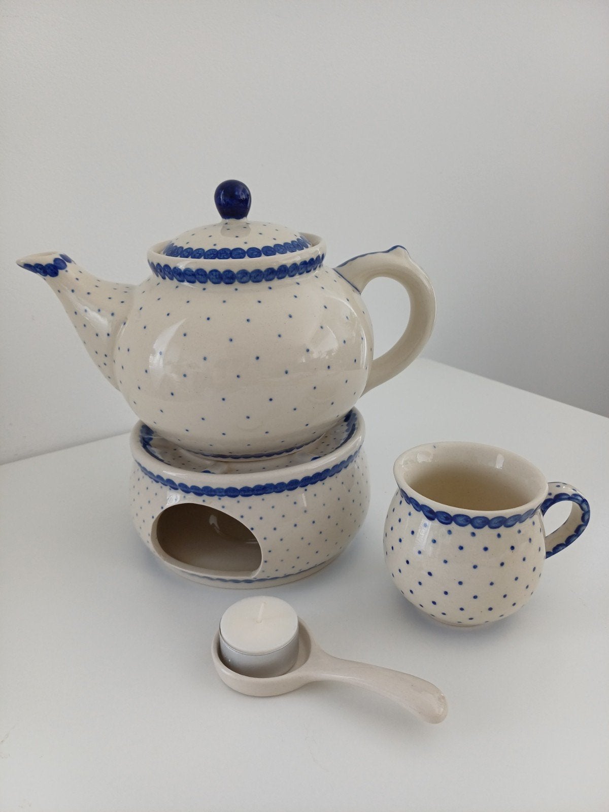 Theepot met theelicht en beker (Bunzlau Castle), Ophalen